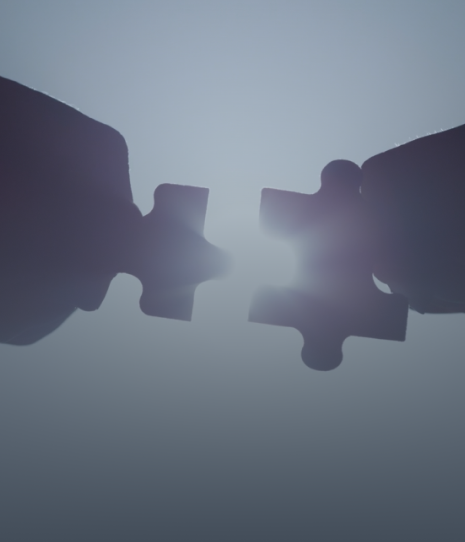Hands holding puzzle pieces against a bright background, symbolizing the connection and integration of financial advisory services and Google Business Profile verification.
